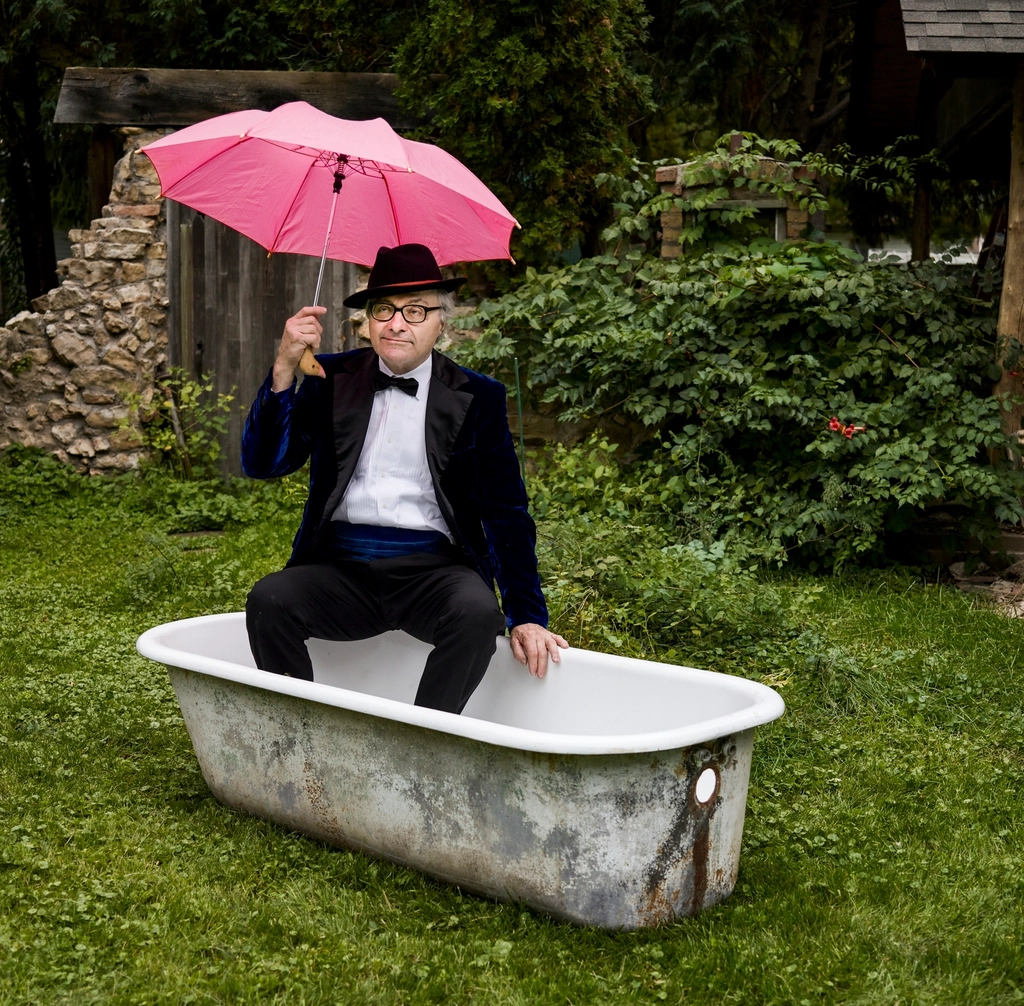 Retired gentleman pink umbrella tub