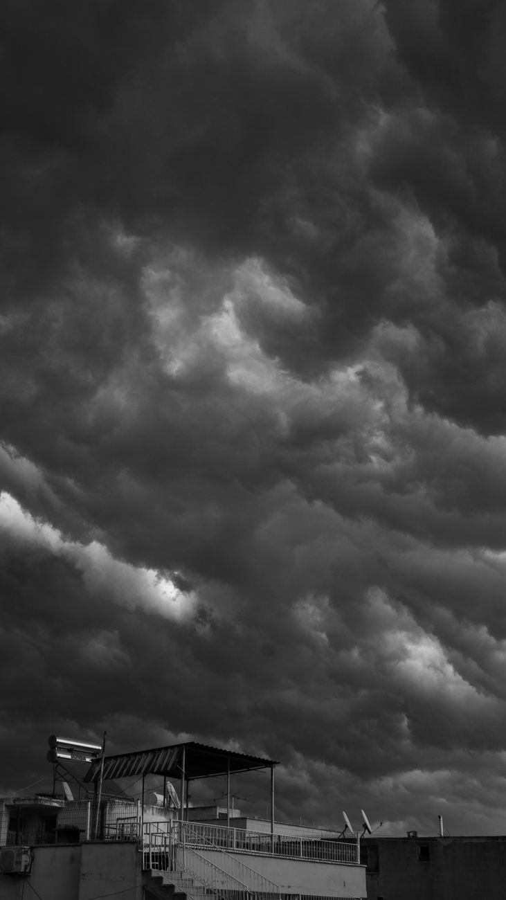 storm cloud over buildings