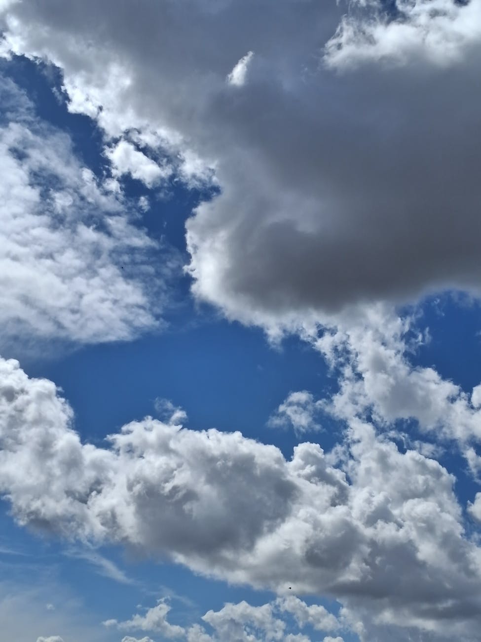 dramatic cloudscape against blue sky